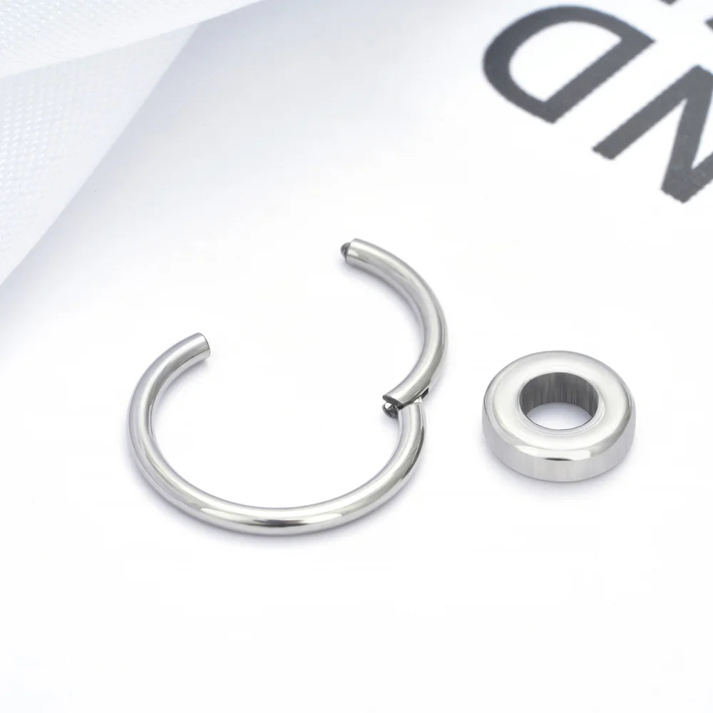 Dangle septum ring with a small circle 16G titanium septum clicker