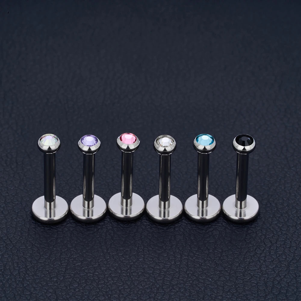 Diamond Monroe piercing with a clear pink purple black blue stone titanium labret stud marilyn monroe lip piercing